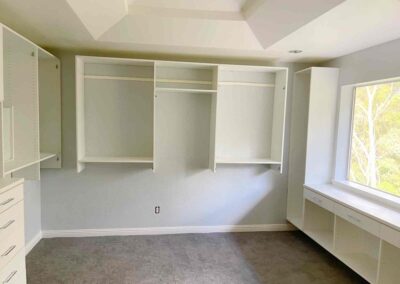 photo showing a second floor room with a newly finished octagon shaped ceiling and painted walls and cupboards that was finished by Mckeague Drywall in mililani oahu hawaii