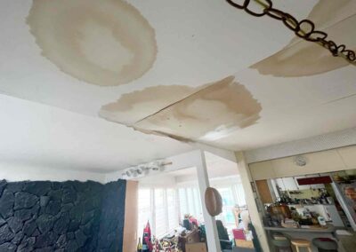 Close up photos of a cenec ceiling with water leak damage that was later replaced by Mckeague Drywall in Kamiloiki oahu hawaii