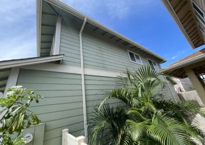 BEFORE - exterior painting of green house in Hawaii by Mckeague Drywall