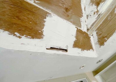 photo showing a second floor room with an unfinished octagon shaped ceiling that was fixed and finished by Mckeague Drywall in mililani oahu hawaii