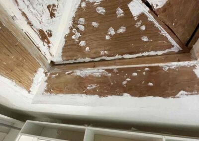 photo showing a second floor room with an unfinished octagon shaped ceiling that was fixed and finished by Mckeague Drywall in mililani oahu hawaii
