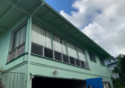 Hawaii house exterior painted green by Mckeague Drywall