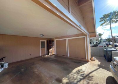 A home in Hawaii that had its exterior painted tan by Mckeague Drywall
