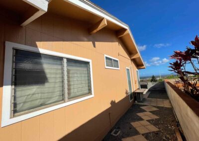 A home in Hawaii that had its exterior painted tan by Mckeague Drywall